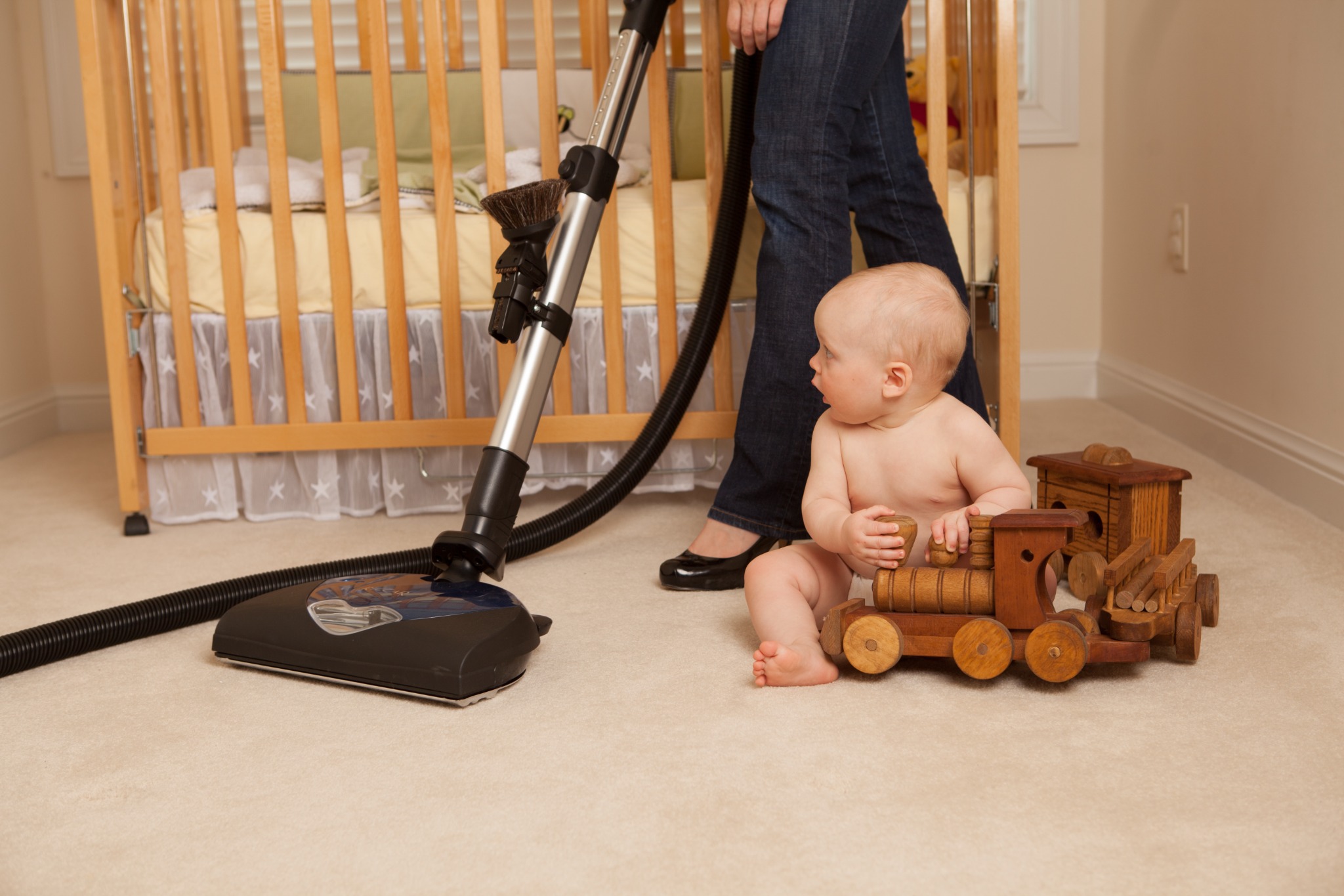Riccar central vacuum attachment kit cleaning carpet in a home